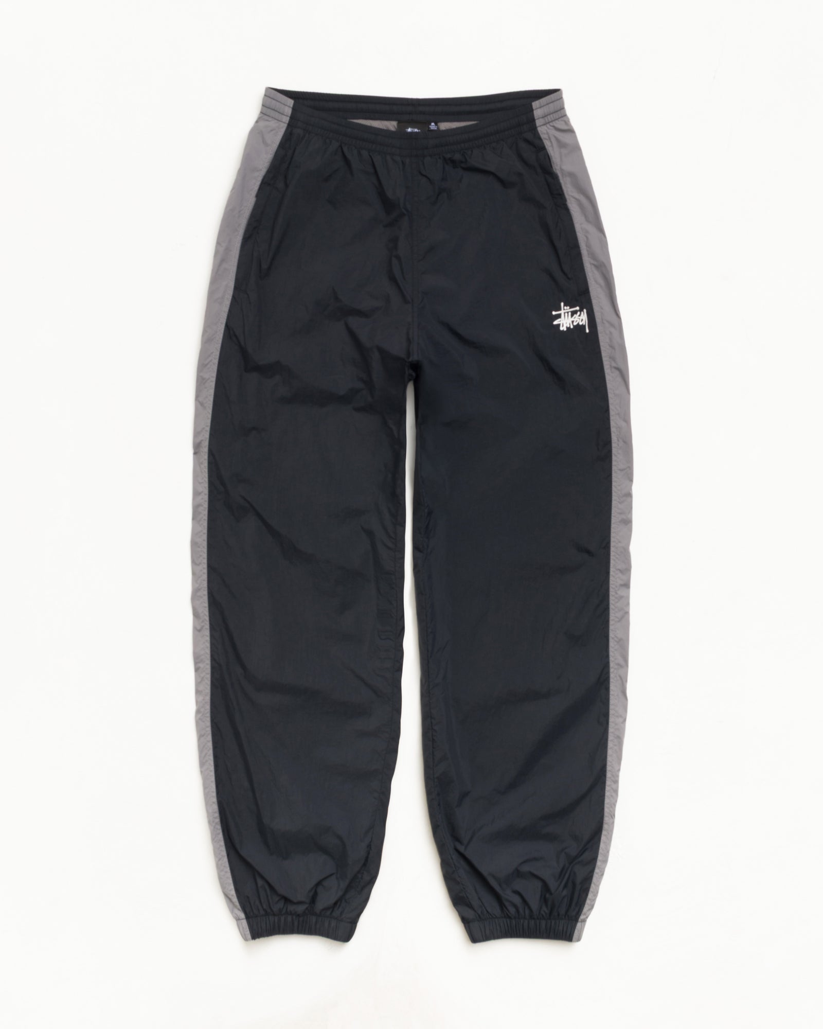 Stussy Side Stripe Track Pant tuta nera nylon relaxed