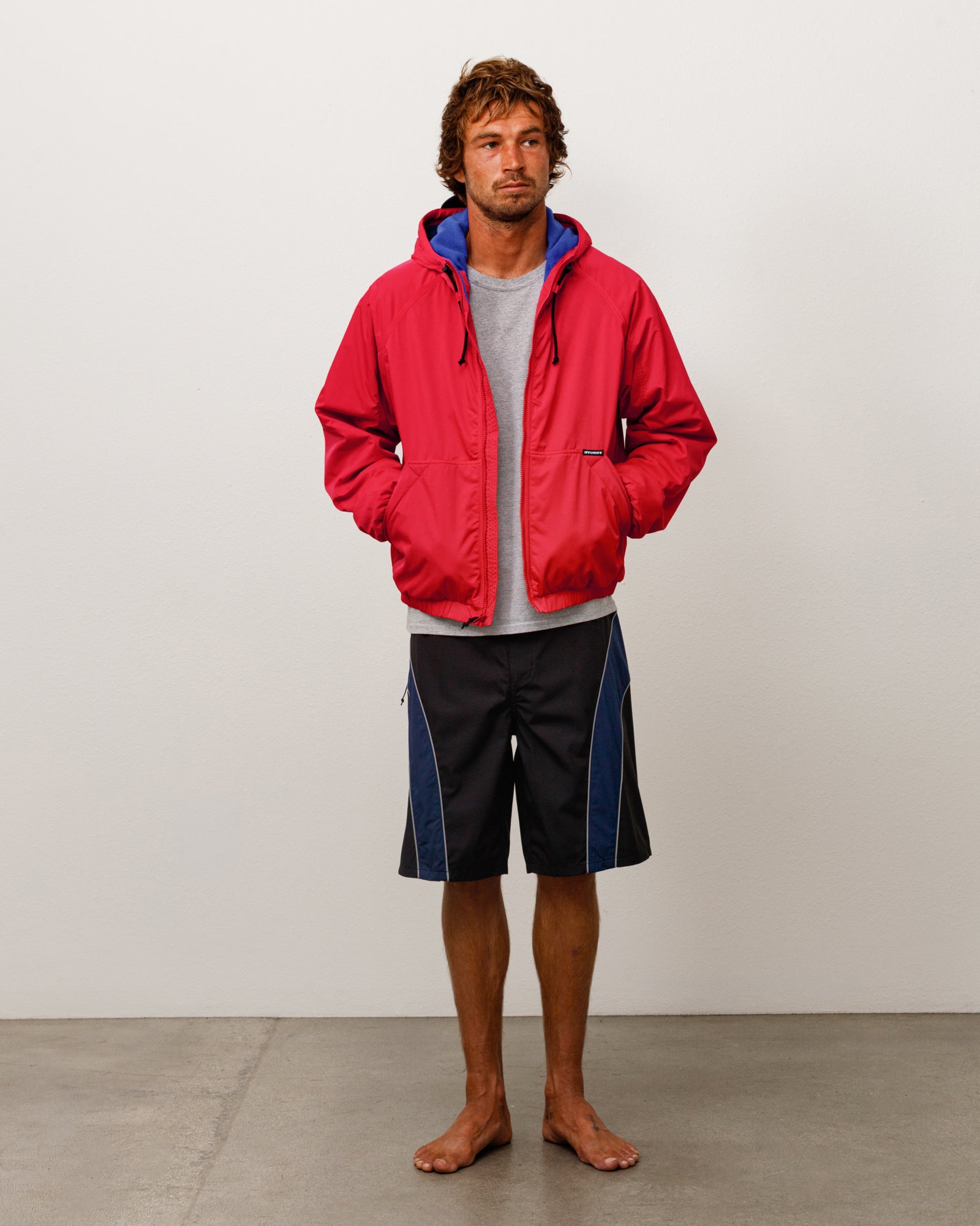 Stussy Outerwear Coastline giacca rossa cappuccio nylon pile