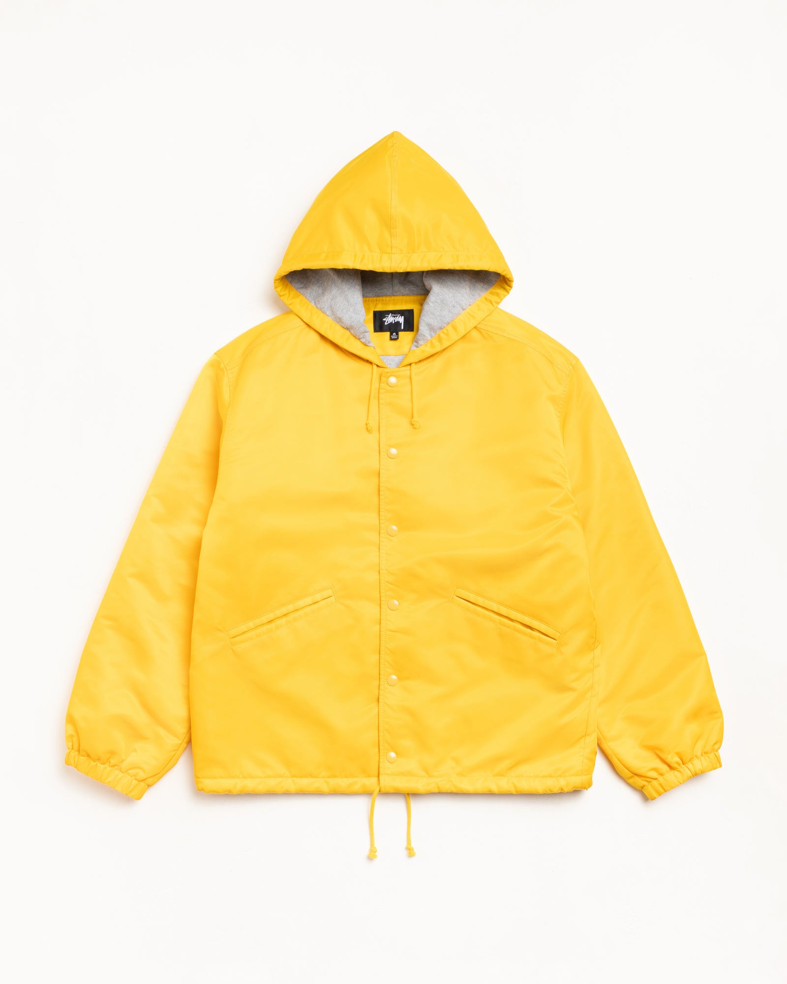 Stussy Hooded Coaches Jacket giacca gialla nylon imbottita