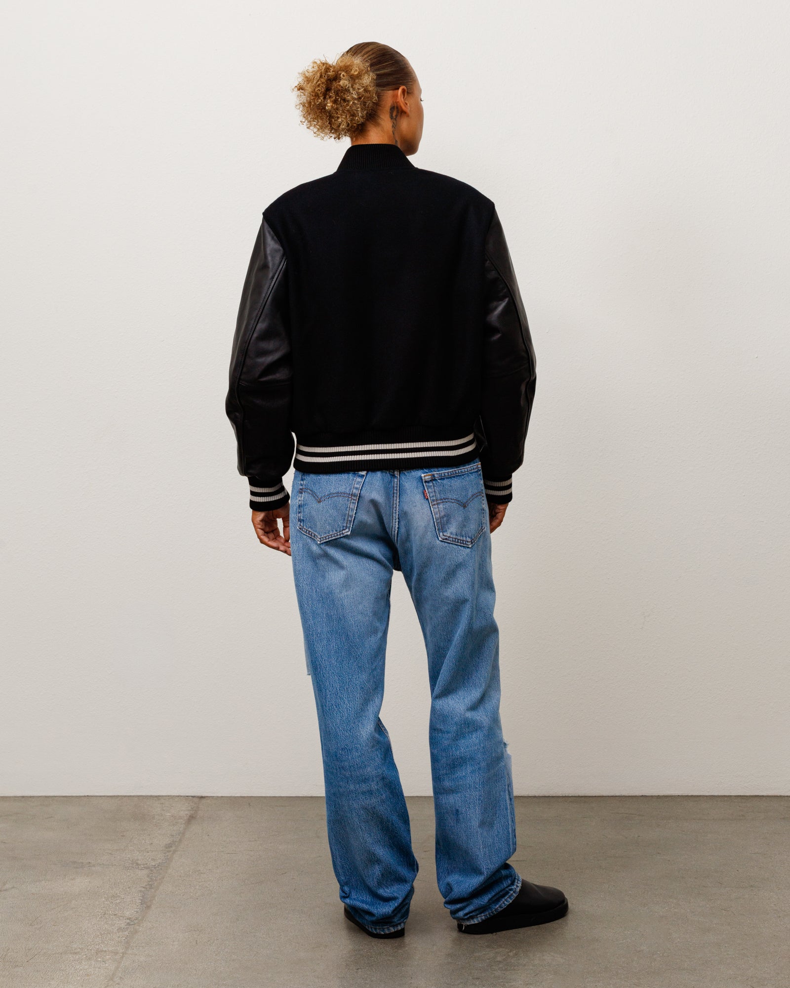 Stussy Wool Varsity giacca nera 75% lana maniche pelle