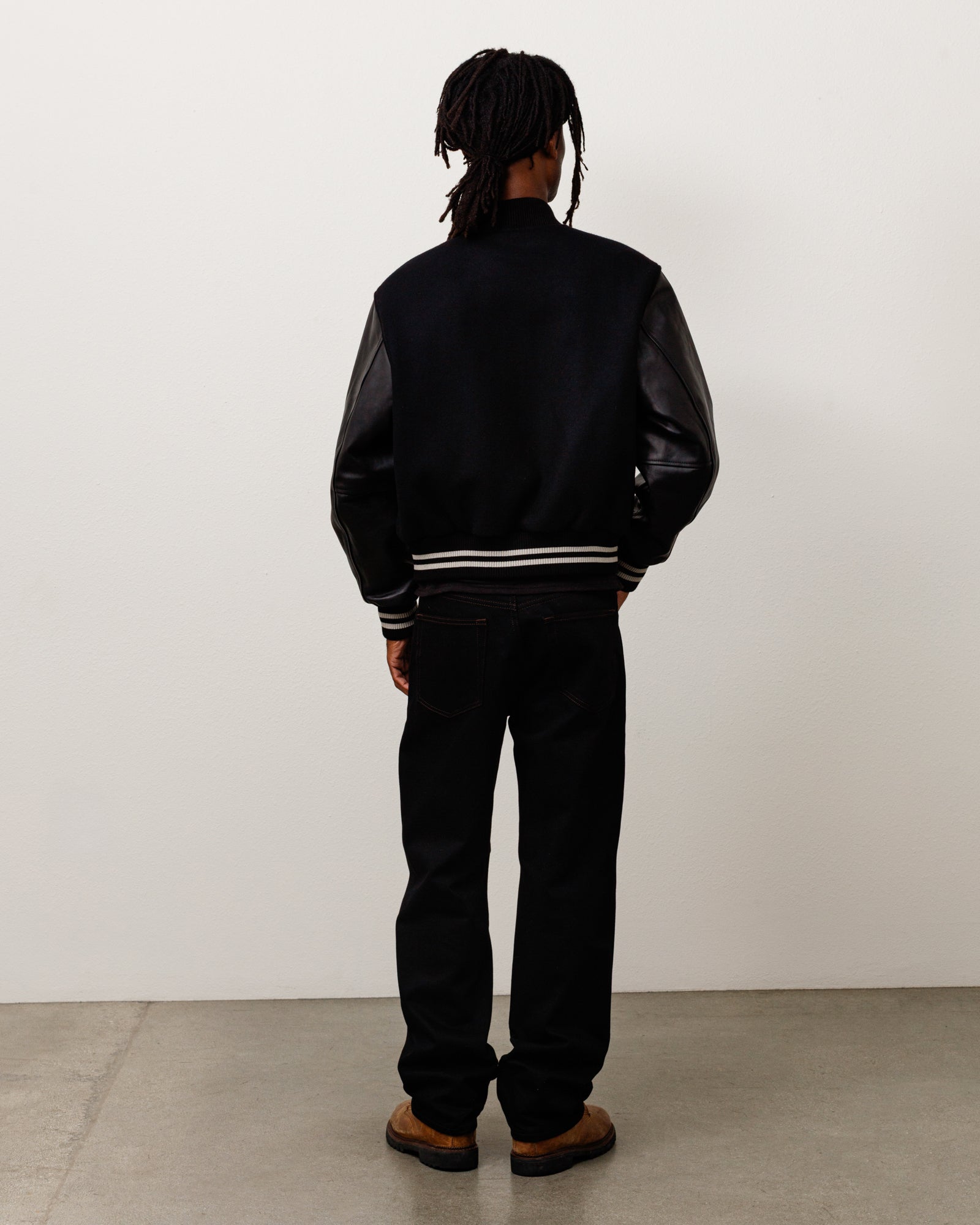 Stussy Wool Varsity giacca nera 75% lana maniche pelle
