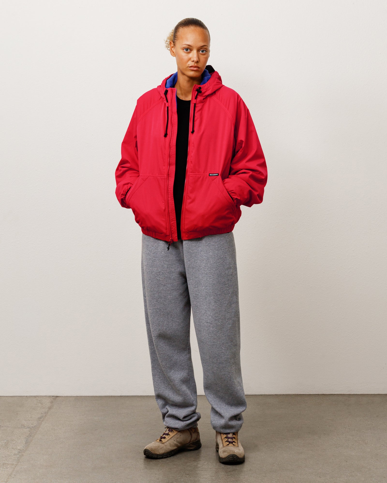 Stussy Outerwear Coastline giacca rossa cappuccio nylon pile