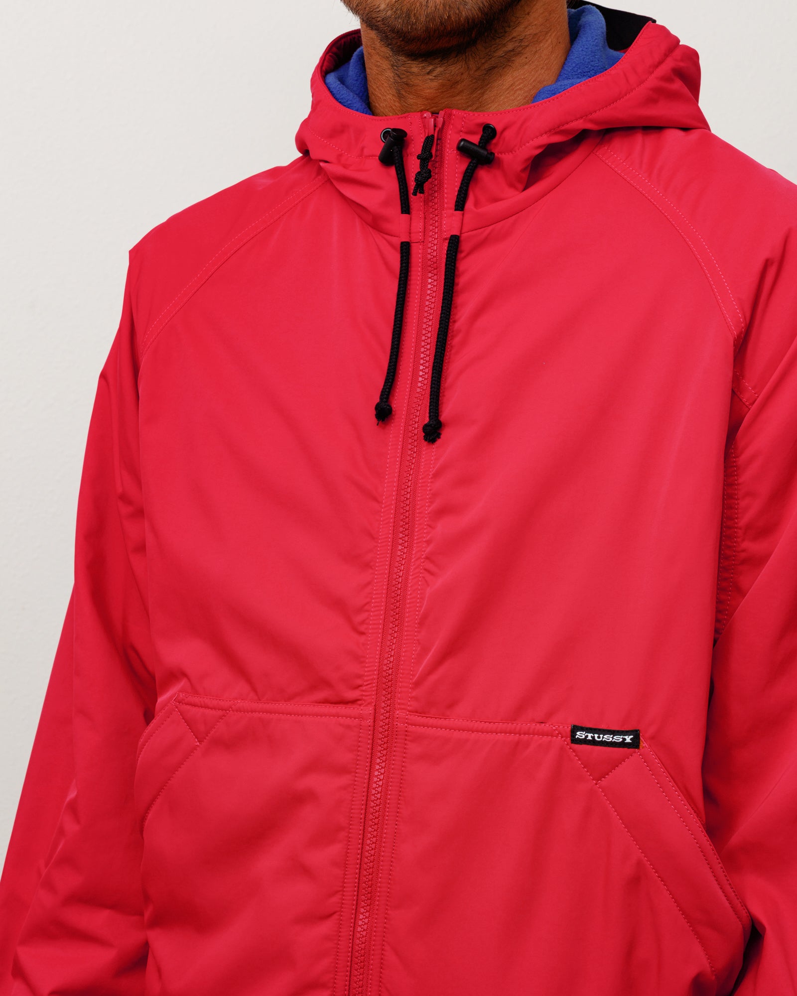 Stussy Outerwear Coastline giacca rossa cappuccio nylon pile